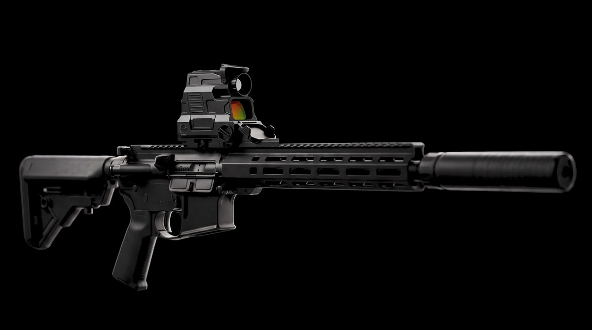 Night Operators HYBRID on a suppressed black rifle, side view on black