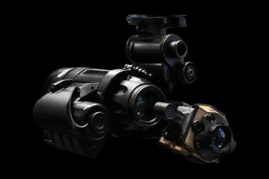 COTI clip-on thermal imager clamped on the objective lens of a PVS-14 PRO night vision monocular