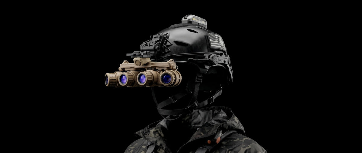 OPNVG-18 quad night vision goggle in sand, on a black helmet